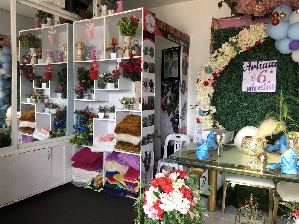 Bridal Services in Kampala Uganda. Slick Bridal And Events Uganda Services Offered: Bridal Wear, Bridal Gowns, Bridesmaid Dresses, Dresses for Wedding, Event Decor, Florist, Gift Shop at Akamwesi Shopping Mall in Kampala Uganda. Ugabox