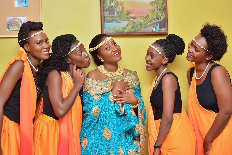 Traditional Bridal Wear in Kampala Uganda. Bridal Tailoring And Hiring Services. Banyakitara Cultural Wear/Western Uganda Cultural Fashion. Western Uganda Bridal Fashion: Mushanana, Kinyankole Wear, Bakiga Bridal Wear, Batoro And Bunyoro/Banyoro Bridal Modern Cultural Wear, Buganda Gomesi Supplier, Bespoke Bridal Tailoring Services, Girls/Women Traditional Clothing/Bridal Wear in Uganda, Bridal Fashion Uganda, Her Collection by Claire Uganda, Bridal Shop Uganda, Ugabox