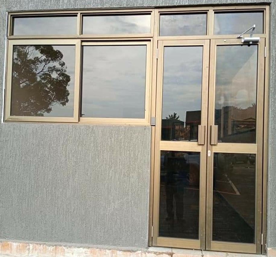Aluminium Profile Column Doors in Kampala Uganda, Aluminium Design Works/Installation and Glass Solutions in Uganda, Luxury Aluminium and Glass Solutions Uganda, Ugabox