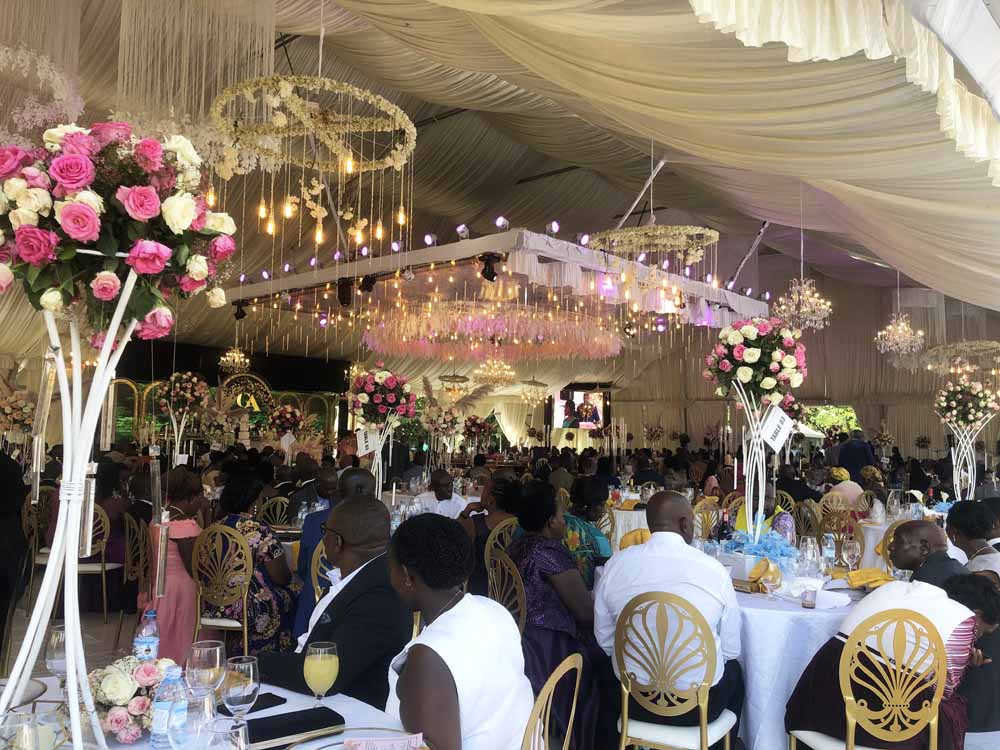 Wedding Reception Venue/Wedding Gardens in Kampala Uganda. Create Your Dream Wedding or Party Event Amidst Lush Gardens/Trees. Corporate Event Venue, Outdoor Wedding Venue, Bridal Gardens And Picnic Gardens, Party Venue, Event Venue for Private And Public Functions: Wedding Venue, Introduction Venue, and Birthday Parties Venue, Kuhingira/Give Away Ceremony Venue, Baby Showers And Bridal Showers Venue in Kampala. For Booking/Reservation Contact Akamwesi Gardens Management Located at Akamwesi Shopping Mall in Kyebando Along Gayaza Road in Kampala Uganda. Ugabox