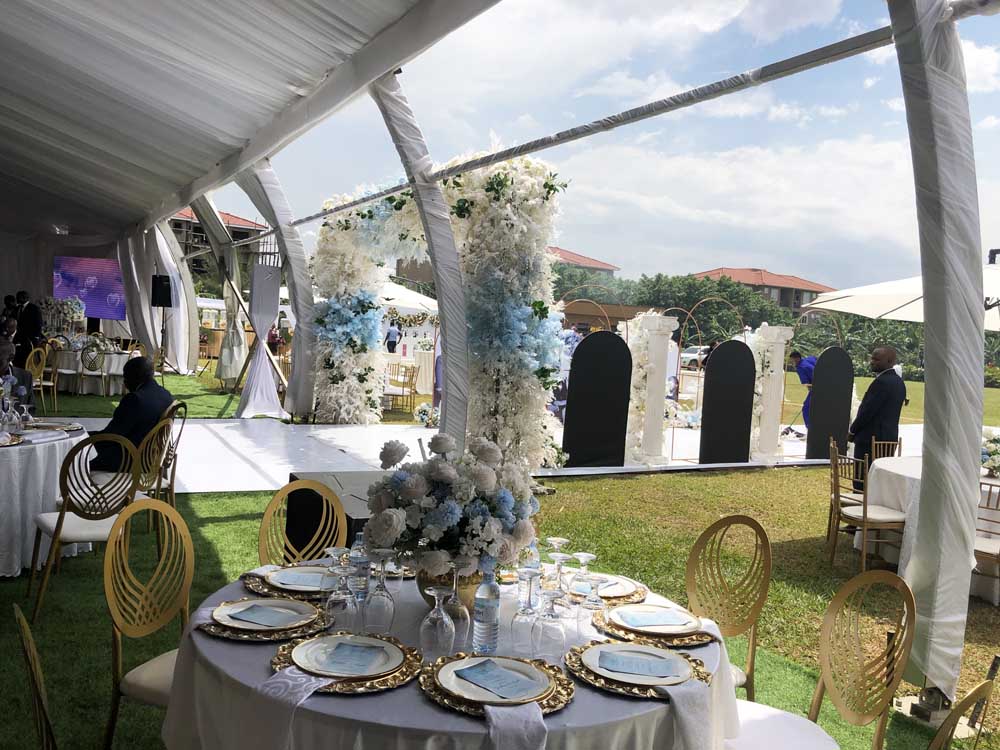 Kigo Gardens Uganda. Services: Wedding Gardens, Wedding Reception Venue, Bridal Gardens, Party Venue, Music Festival Venue, Events Venue in Uganda. Wedding Reception Decoration By Palette Events Uganda. Kigo Gardens Location: Inbetween Kigo Prisons and Mirembe Villas Kigo near Serena Hotel Kigo, Enroute Kajjansi-Munyonyo Speke Resort Kampala Entebbe Express Highway, Central Uganda, Wakiso District, Uganda. Ugabox