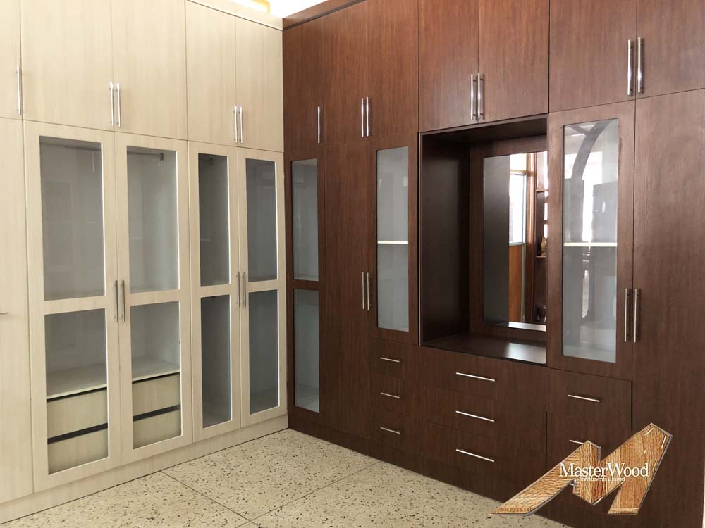 Wardrobes for Sale in Kampala Uganda. Home/House Wardrobes Installation in Kampala Uganda. Visit our Showroom in Luzira Kampala Uganda to See All Our Wood Products Or Give Us a Call: +256 393 266 386 Masterwood Investments Limited Uganda. Ugabox