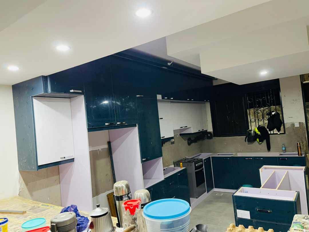 Kitchen cabinets design in Kampala Uganda. Wood cabinets installation. Trust Interiors Uganda. Leading interior design company in Uganda. Services: Interior design services, installation services, manufacturing of modern stylish furniture products in Uganda, East Africa. ugabox.com