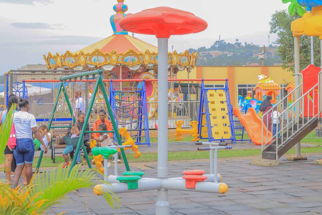 Amusement Parks in Kampala. Play Grounds For Children, Toddlers, Kids And Teenagers. Kids Amusements And Games: Slides(hide and seek slide), swings, bouncing castle, bumper cars, tambourine, gyroscope, and carousel in Kampala Uganda Ugabox