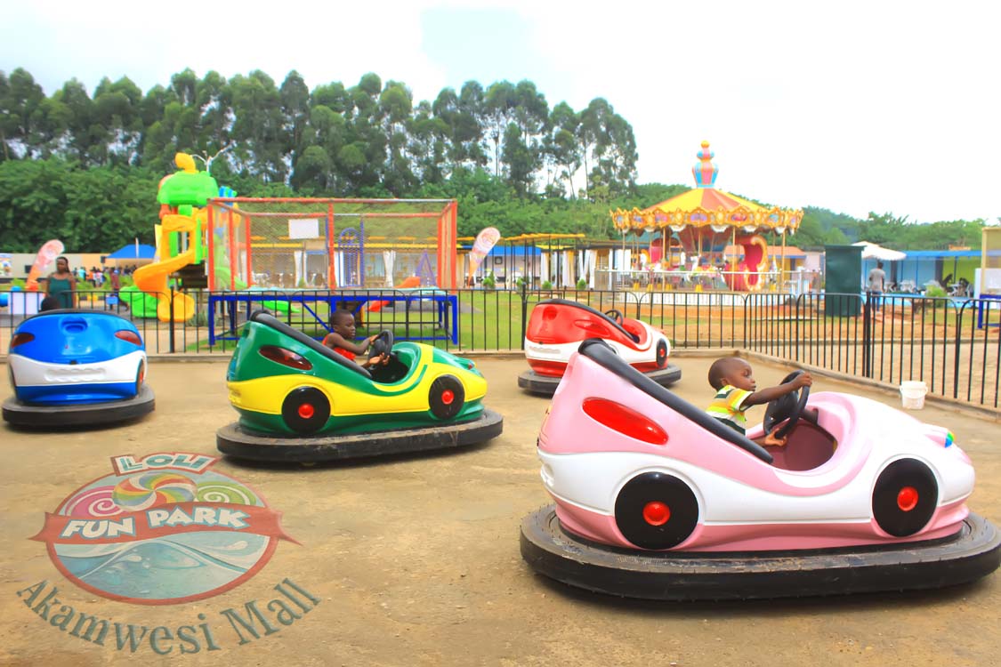 Kids Play Areas In Uganda, Kampala Play Grounds For Children,  Toddlers, Kids And Teenagers. Kids Activities And Games: Slides(hide and seek slide), swings, bouncing castle, bumper cars, tambourine, gyroscope, and carousel in Kampala Uganda, Ugabox